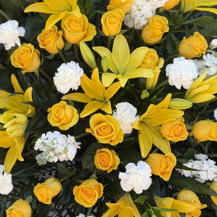 Golden Farewell — Yellow Rose & Lily Standing Funeral Spray